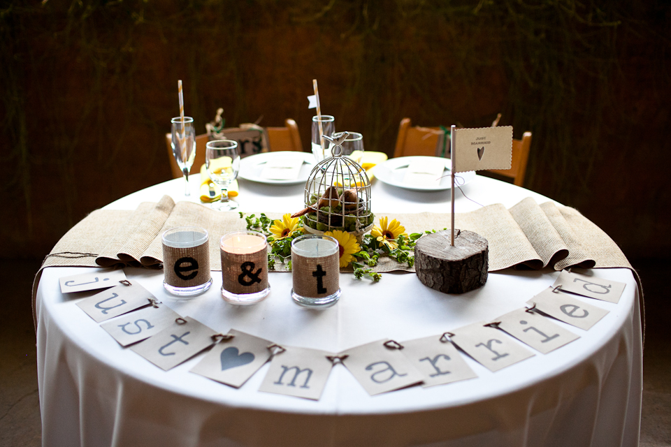 sweetheart table, whimsical reception, flag, wood, bride and groom, wedding