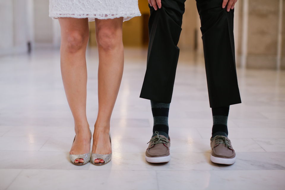 san francisco city hall civil ceremony photographer, ring exchange, city hall, civic center, san francisco engagement photographer, feet shot of bride and groom, jimmy choos, fun socks