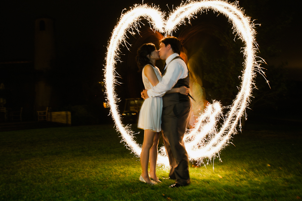 monterey wedding photographer, long exposure wedding couple, long exposure sparklers, sparklers make a heart, wedding couple kiss