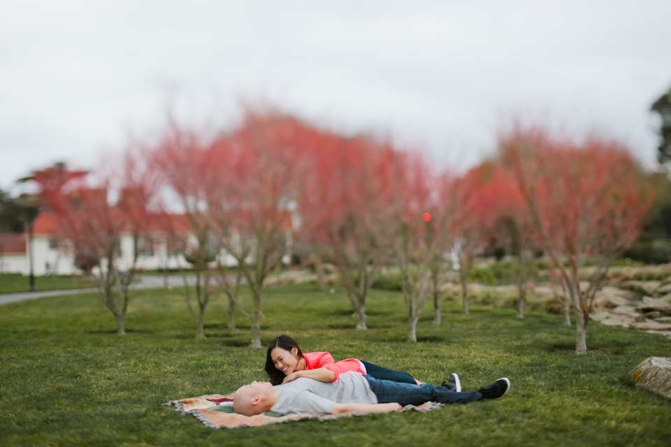 san francisco presidio engagement, Letterman Digital Arts Center, couple in front of river, wedding couple, ombre red trees, couple laying down in picnic,
