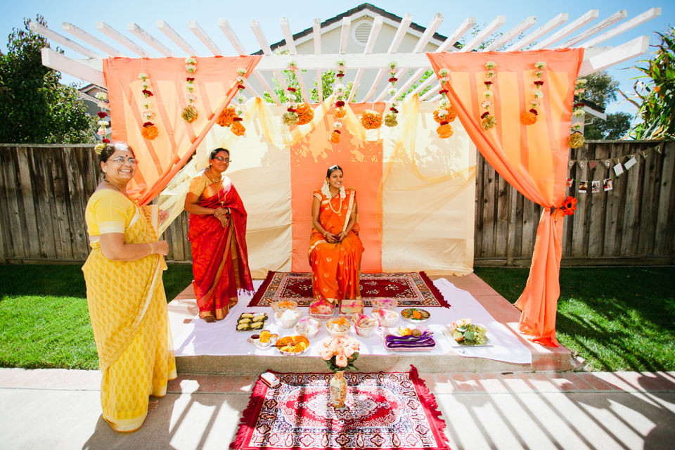 a-table-topped-with-lots-of-food-on-top-of-a-red-and-white-striped-cloth