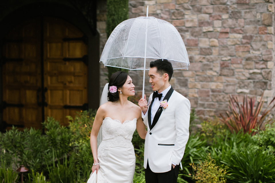 casa real winery wedding, vineyard wedding, east bay wedding photographer, east bay wineries, pouring rain on wedding day, cute umbrellas, the glamourist, lightbulb videography, pink blush wedding, blue and pink wedding, indoor romantic ceremony, cakepops seating cards, creative wedding photography, jasmine lee photography