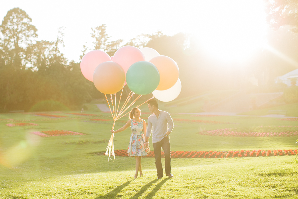 whimsical engagement session, bouquet of weather balloons, golden light, golden gate park engagement session, conservatory of flowers engagement session, park tavern north beach engagement session, romantic dinner date, bourbon on the rocks, marquee letters, outdoor engagement session, tacori engagement ring, off camera lighting, creative engagement photos, bay area wedding photographer, san francisco engagement photographer, san francisco engagement photos, jasmine lee photography